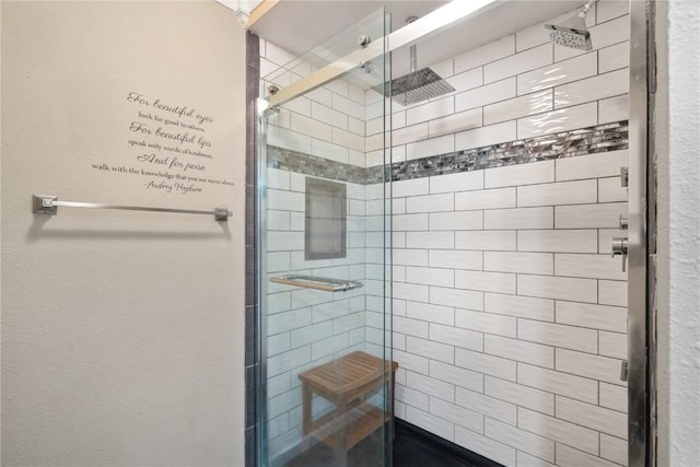 bathroom featuring a shower stall