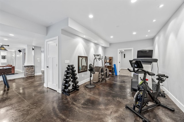 workout area with recessed lighting, baseboards, and ornate columns