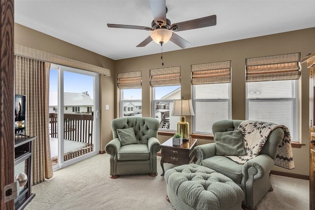 interior space featuring ceiling fan