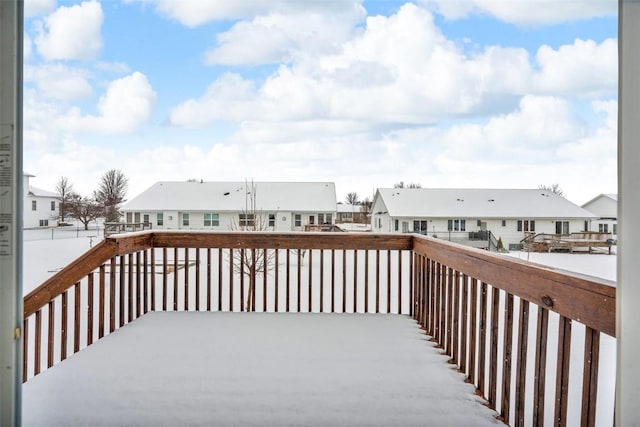 wooden deck featuring a residential view