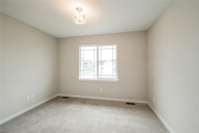 6166 Cope Dr, Marion, IA 52302 - spare room featuring carpet floors and baseboards