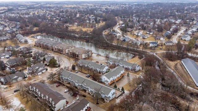 bird's eye view with a residential view and a water view