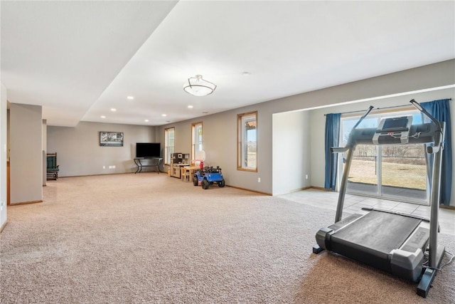 exercise room featuring a wealth of natural light, recessed lighting, baseboards, and carpet floors