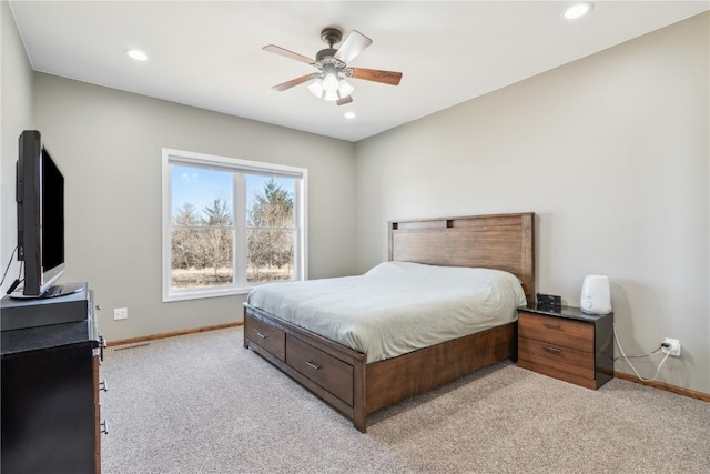 bedroom with ceiling fan, recessed lighting, baseboards, and light carpet