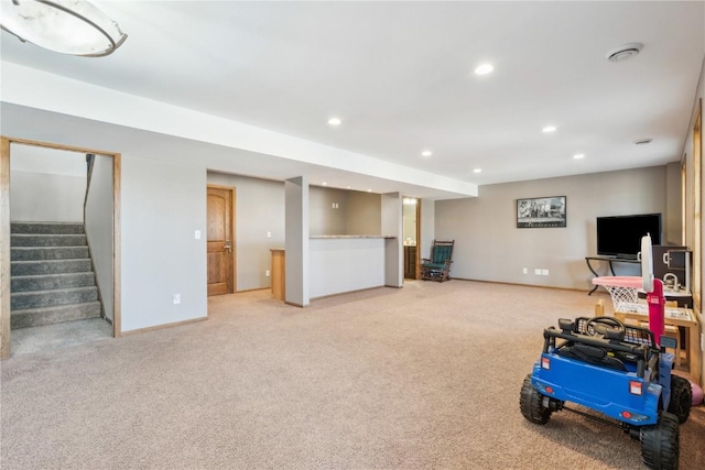 game room featuring recessed lighting, baseboards, and light carpet