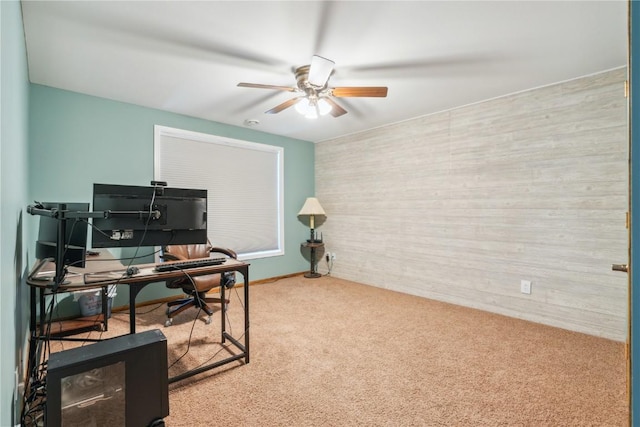 office with carpet floors and ceiling fan