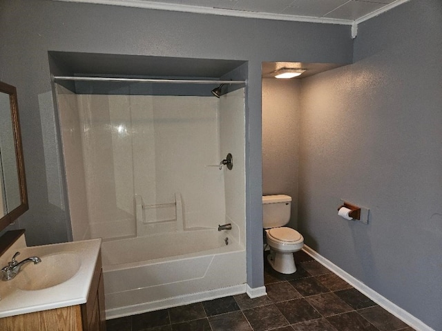 full bathroom featuring vanity, toilet, tub / shower combination, and baseboards