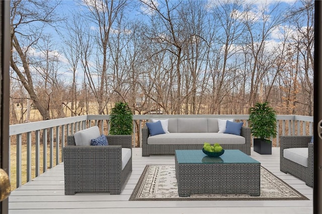 wooden deck featuring an outdoor hangout area