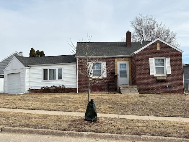 single story home with entry steps, roof with shingles, a garage, brick siding, and a chimney