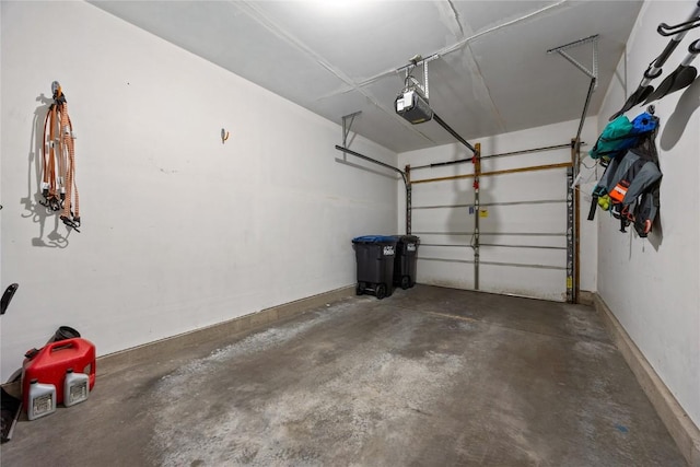 3260 Willowridge Rd Unit D, Marion, IA 52302 - garage featuring a garage door opener