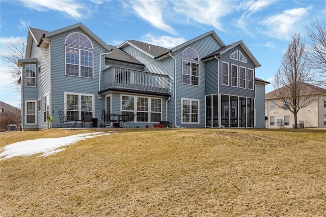3260 Willowridge Rd Unit D, Marion, IA 52302 - back of house featuring a balcony, a yard, and central AC