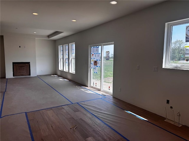 225 Meadows Field Dr NE, Cedar Rapids, IA 52402 - unfurnished living room featuring a fireplace and recessed lighting