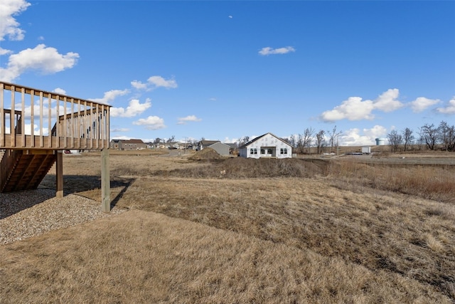 view of yard featuring a wooden deck