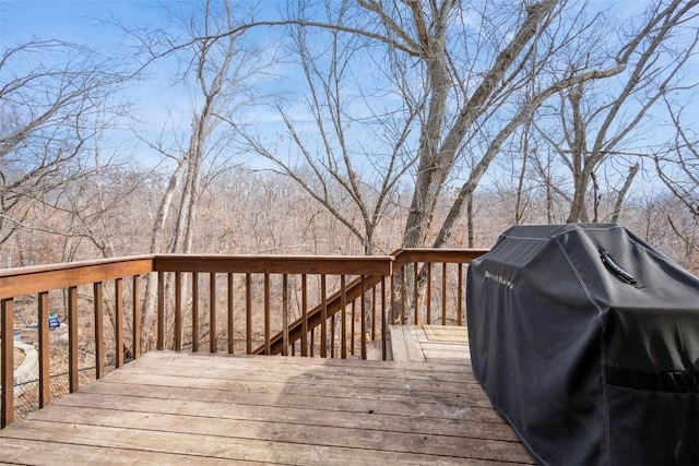 wooden terrace with grilling area