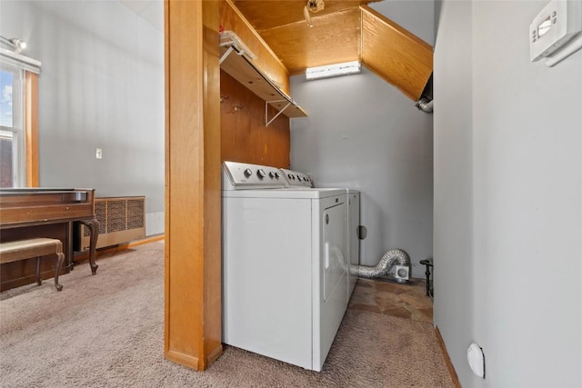 laundry area featuring washer and dryer and carpet floors