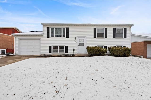 split foyer home featuring an attached garage