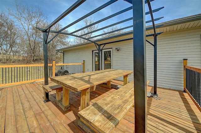 deck with outdoor dining area