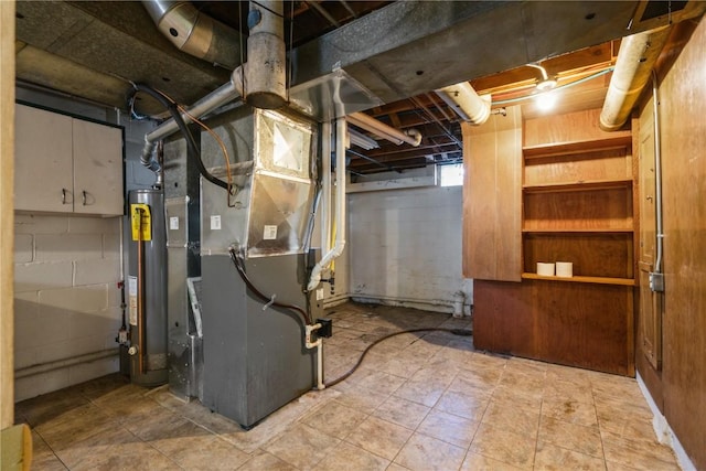 unfinished below grade area featuring heating unit and water heater