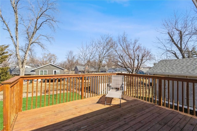 wooden deck with a yard