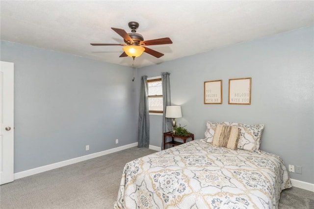 bedroom featuring baseboards, carpet floors, and ceiling fan