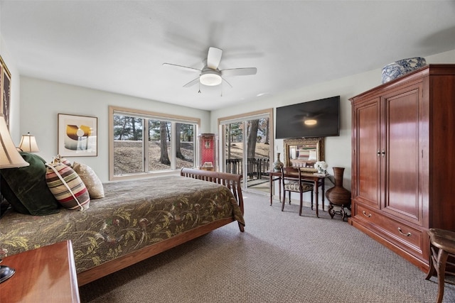 carpeted bedroom with access to outside and a ceiling fan