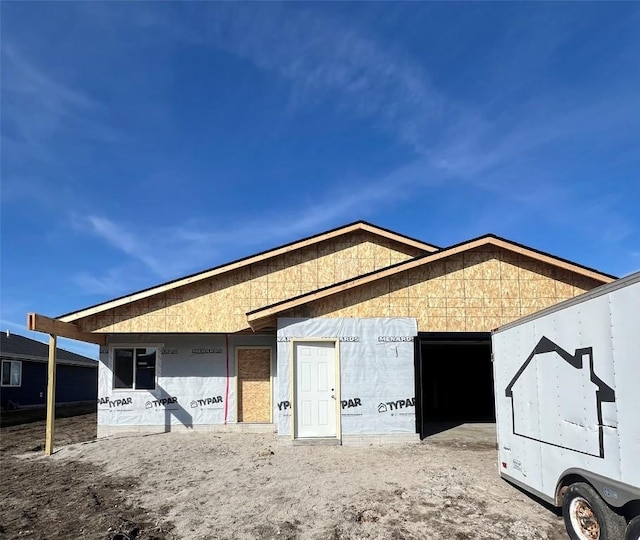 exterior space with a garage