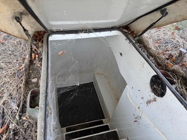 view of entry to storm shelter