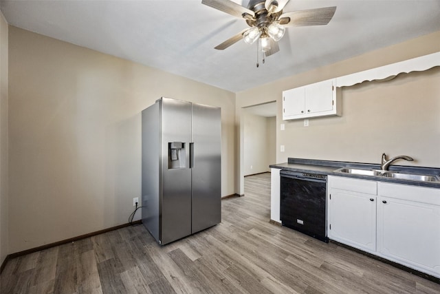 kitchen featuring dishwasher, light wood-style flooring, stainless steel refrigerator with ice dispenser, white cabinetry, and a sink