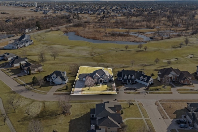 aerial view featuring a residential view and a water view