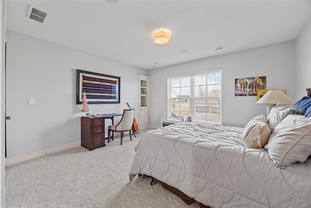 bedroom featuring visible vents, baseboards, and carpet floors