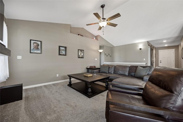 carpeted living room featuring ceiling fan, baseboards, and vaulted ceiling