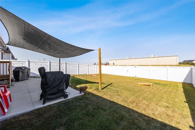 view of yard featuring a patio and a fenced backyard