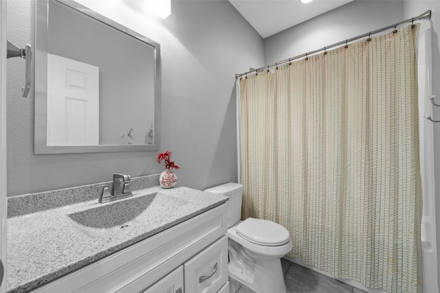 full bathroom with tile patterned floors, toilet, vanity, and a shower with curtain