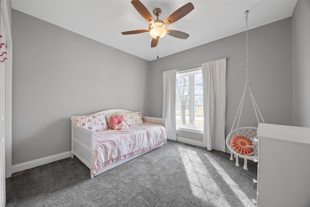 bedroom featuring ceiling fan, carpet, visible vents, and baseboards