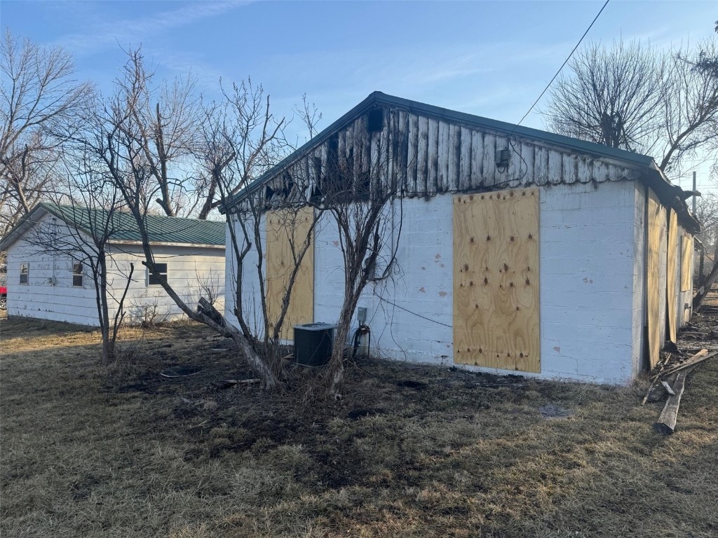 view of outbuilding with cooling unit