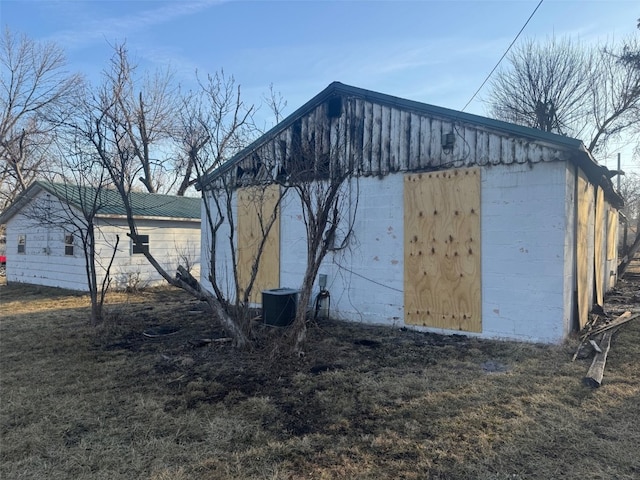 view of outbuilding with cooling unit