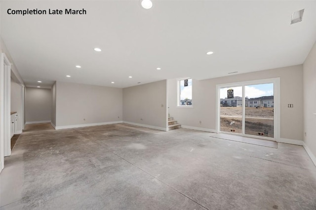 unfurnished room featuring recessed lighting, stairway, baseboards, and concrete floors