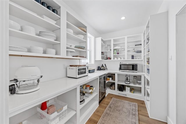 storage area featuring a toaster