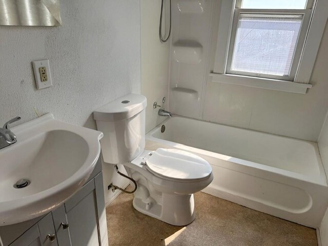 609 Baltimore St, Waterloo, IA 50702 - full bath featuring shower / bath combination, toilet, vanity, and a textured wall