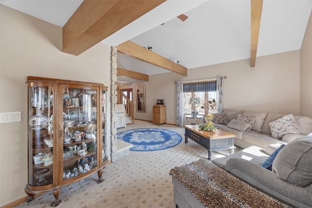 living area with stairway, carpet flooring, lofted ceiling with beams, and baseboards