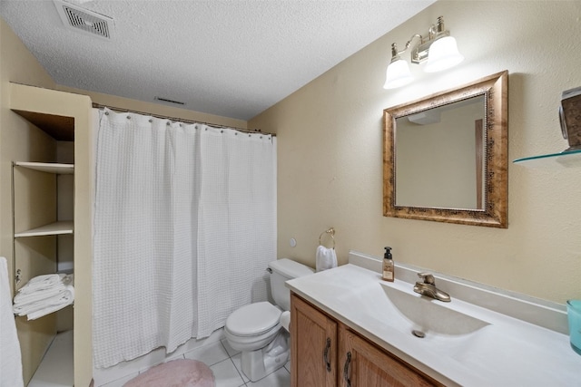 full bathroom with tile patterned flooring, visible vents, toilet, vanity, and a textured ceiling