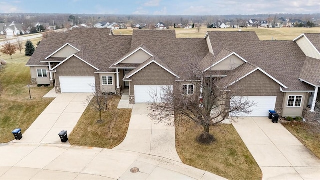 view of front of property with a residential view and roof with shingles