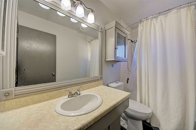 bathroom with visible vents, toilet, vanity, and a shower with shower curtain