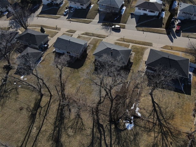 birds eye view of property with a residential view