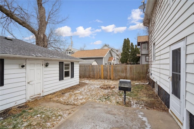 view of yard featuring a patio area and fence