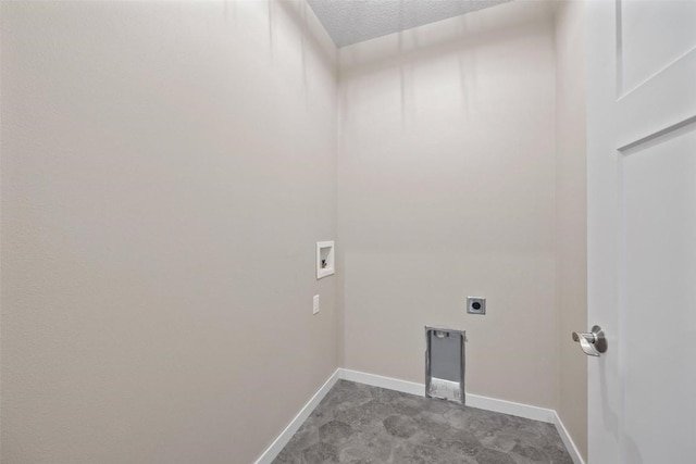 laundry room with electric dryer hookup, washer hookup, a textured ceiling, baseboards, and laundry area