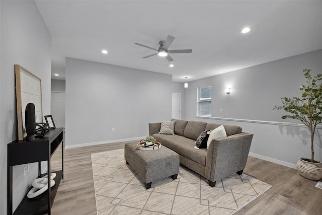 4177 Justified Dr, Marion, IA 52302 - living room with a ceiling fan, light wood finished floors, recessed lighting, and baseboards