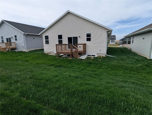 4193 Justified Dr, Marion, IA 52302 - rear view of property with a deck and a lawn