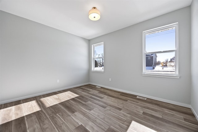 4209 Justified Dr, Marion, IA 52302 - spare room with wood finished floors and baseboards