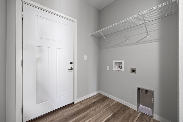 4209 Justified Dr, Marion, IA 52302 - laundry room featuring hookup for an electric dryer, hookup for a washing machine, dark wood-style floors, and baseboards